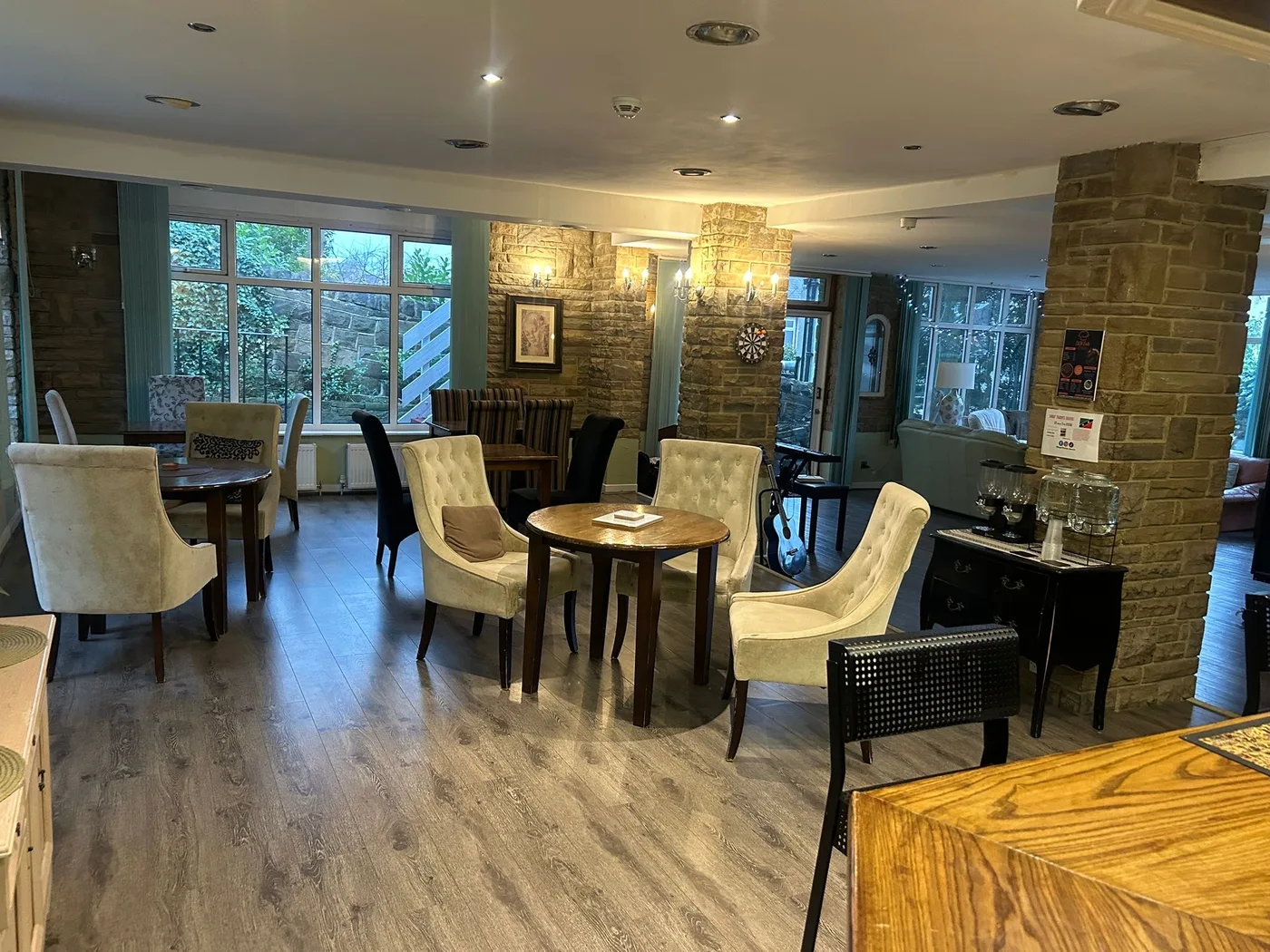 The stone walls and dining room at SKN Eats