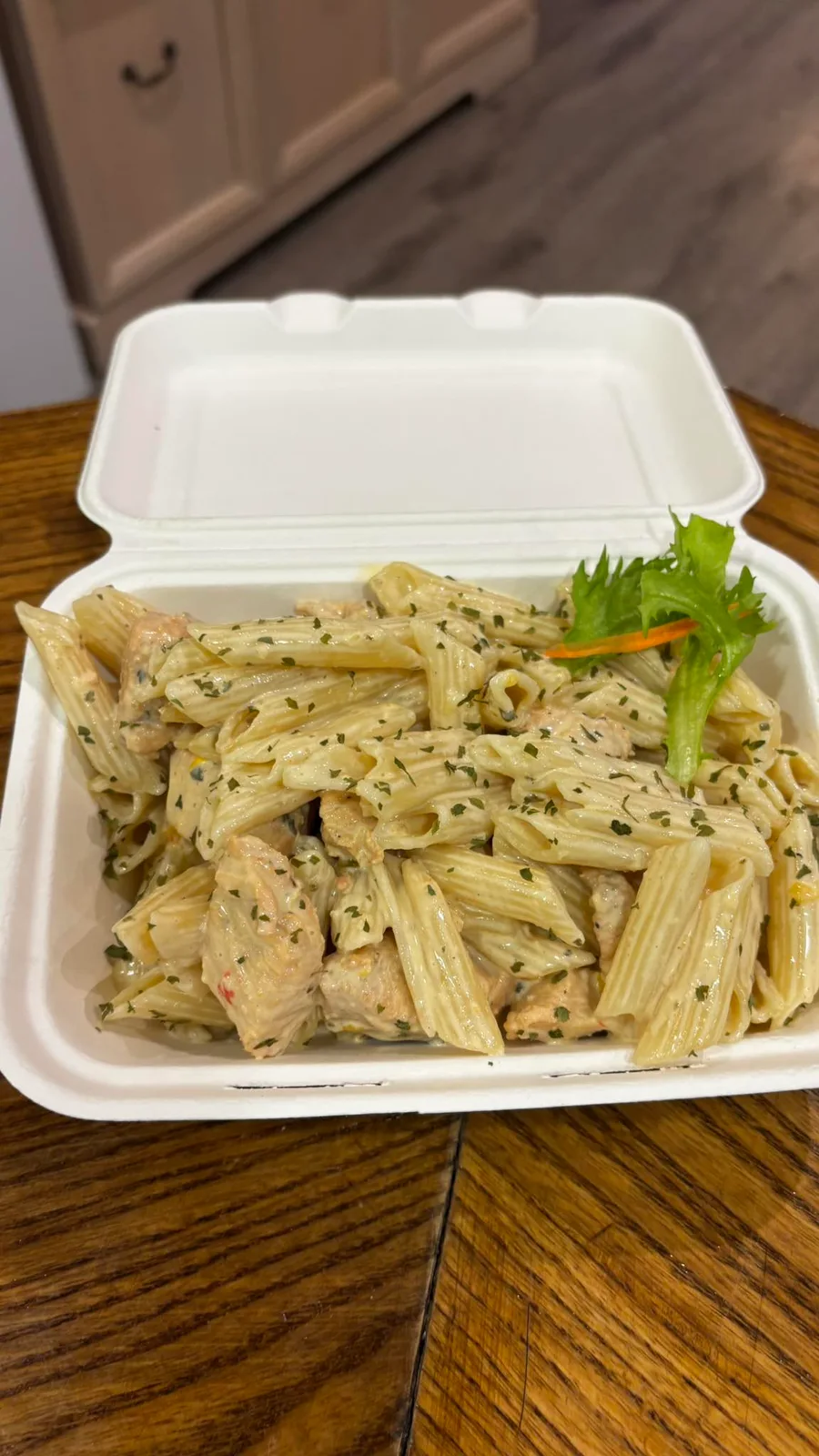 A freshly served pasta takeaway from SKN Eats